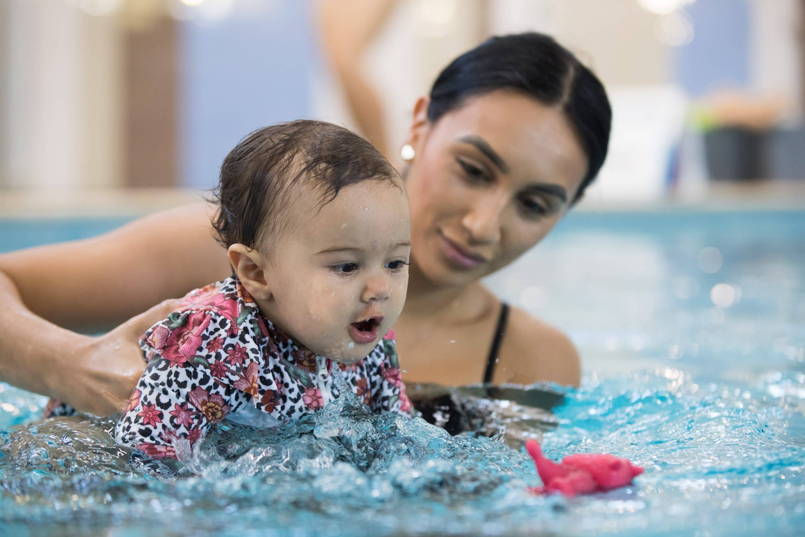 Benefits of toddler and baby swimming lessons on physical development